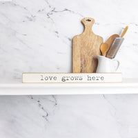 Love Grows Here Skinny Sign