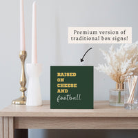 Raised On Cheese And Football Block Sign