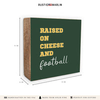 Raised On Cheese And Football Block Sign