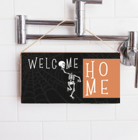 Welcome Home Skeleton Twine Hanging Sign